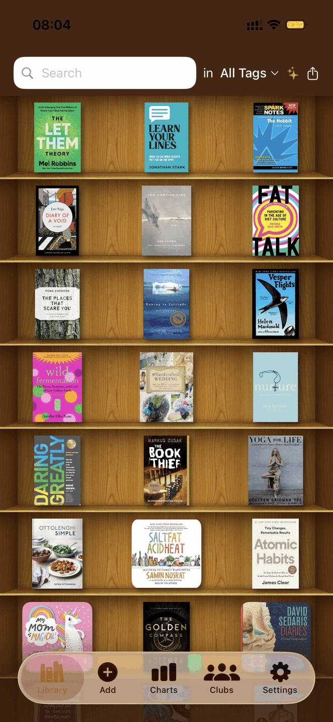 MyBookList cover-first library grid on iPhone